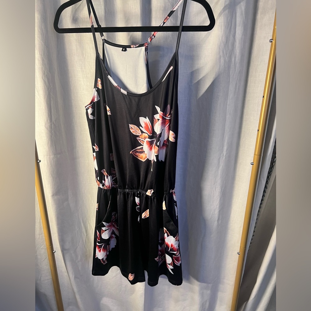 Floral short on piece romper with pockets